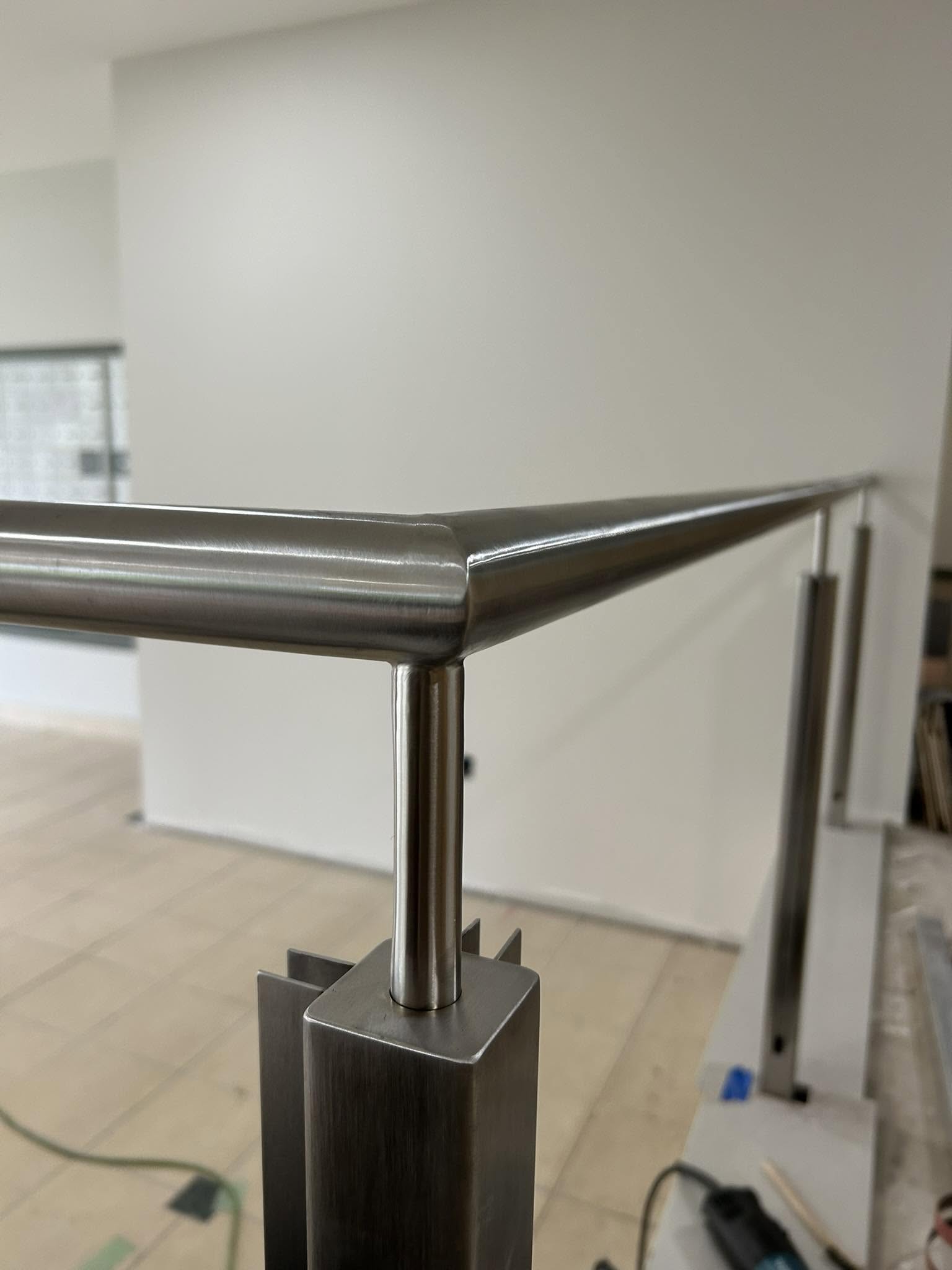 Stainless handrail corner