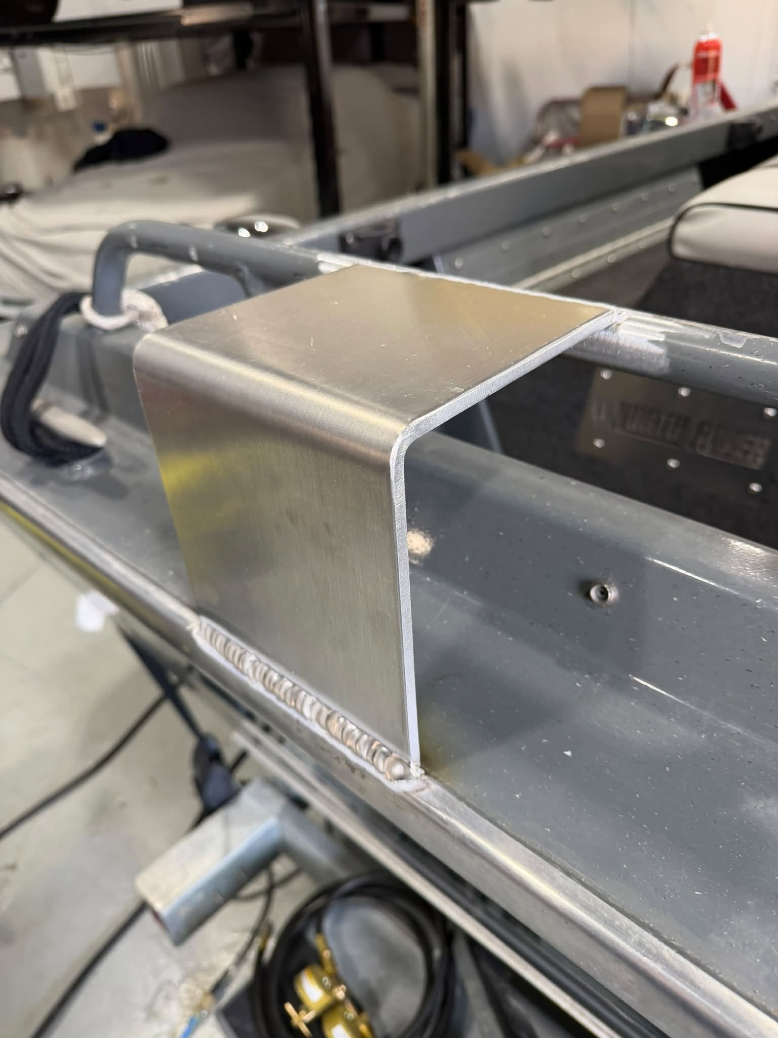 Aluminum bracket welded on boat gunnel